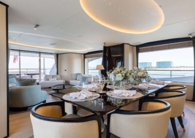 Luxury yacht dining area with elegant decor.