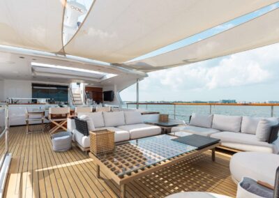 Luxurious yacht deck with stylish seating area.