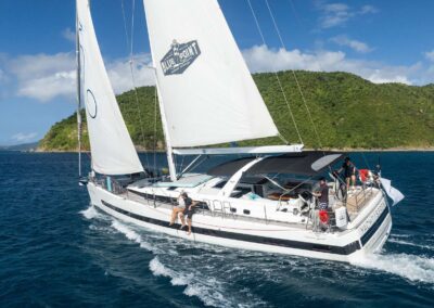 Sailing yacht in a tranquil blue sea.