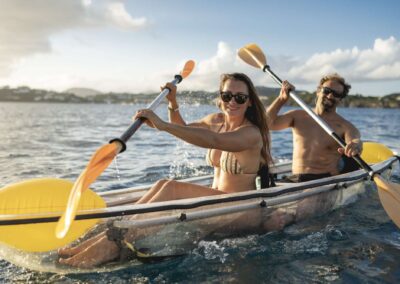 Couple kayaking on a sunny day.