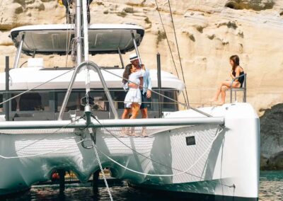 Couple enjoying time on a yacht.