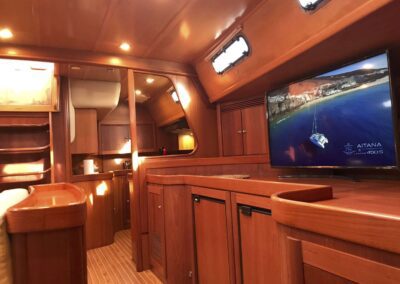 Cozy interior of a yacht with television.